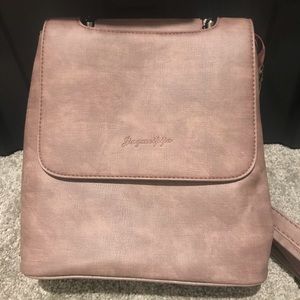 Spacious dusty pink leather backpack